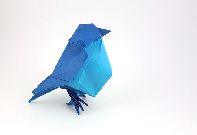 Origami Little bird by Hideo Komatsu. Folded from a square of Fadeless Duet paper by Gilad Aharoni on giladorigami.com