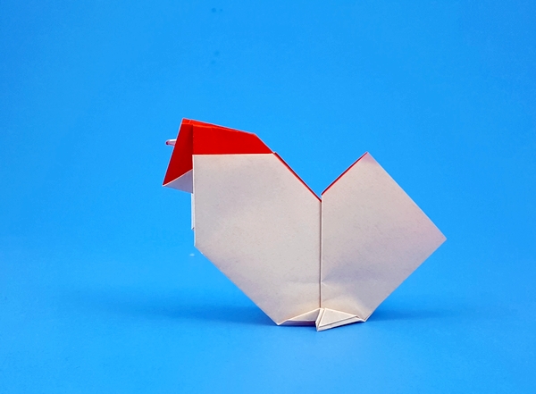 Origami Chicken by Kunihiko Kasahara. Folded from a square of origami paper by Gilad Aharoni on giladorigami.com