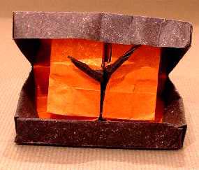 Origami Table clock by Pasquale d'Auria. Folded by Gilad Aharoni on giladorigami.com
