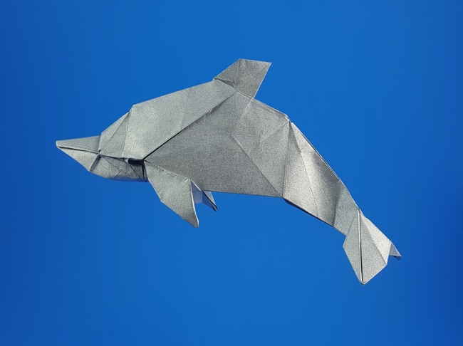Origami Dolphin by Yoo Tae Yong. Folded from a square of Nicolas Terry's tissue-foil by Gilad Aharoni on giladorigami.com