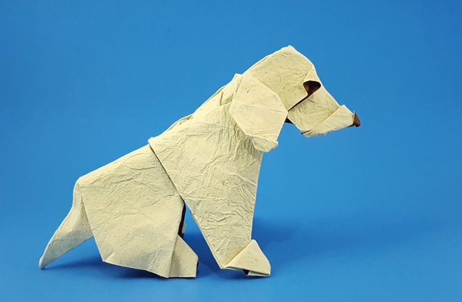 Origami Golden retriever by Pei Haozheng. Folded from a square of tea-stained leather scrapbooking paper by Gilad Aharoni on giladorigami.com