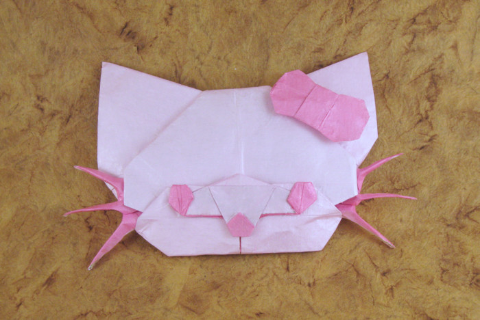 Origami Hello Kitty - Cutie cat by Marc Kirschenbaum. Folded from a square of Kathy Stevick's tissue-foil by Gilad Aharoni on giladorigami.com