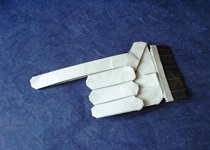 Origami Look! - Pointing hand by Tomo Ogawa folded by Gilad Aharoni
