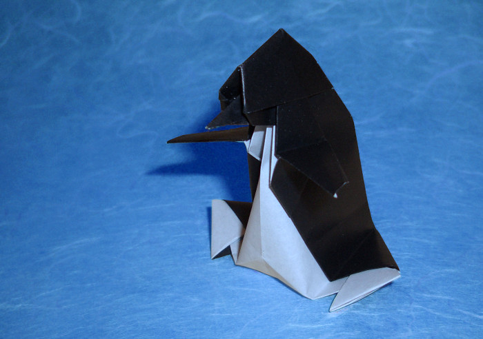 Origami Penguin - skating by Taichiro Hasegawa. Folded from a square of origami paper by Gilad Aharoni on giladorigami.com