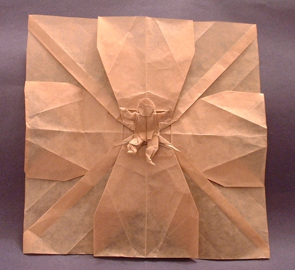 Origami Rock climber by Robert J. Lang. Folded from a square of thin wrapping paper by Gilad Aharoni on giladorigami.com
