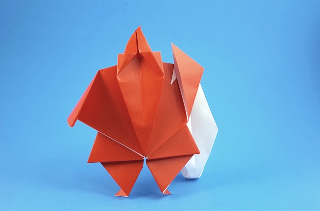 Origami Santa Claus with bag by Akira Yoshizawa. Folded by Gilad Aharoni on giladorigami.com