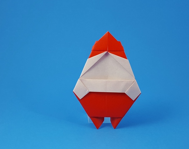 Origami Santa with a pocket by Futawatari Masako. Folded from a square of origami paper by Gilad Aharoni on giladorigami.com