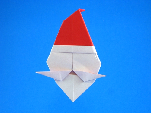 Origami Santa by Stephen A. Palmer. Folded from a square of origami paper by Gilad Aharoni on giladorigami.com