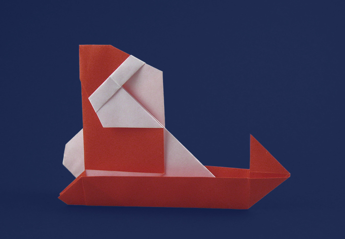 Origami Santa Claus and sled by Sanae Sakai. Folded by Gilad Aharoni on giladorigami.com