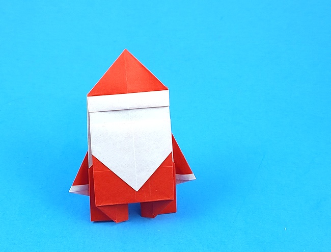 Origami Santa Claus by Lee In Kyung (Whitepaper). Folded from a square of origami paper by Gilad Aharoni on giladorigami.com