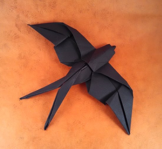 Origami Swallow by Mindaugas Cesnavicius. Wet folded from a square of cardstock by Gilad Aharoni on giladorigami.com