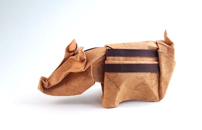 Origami Wild boar piglet by Jozsef Zsebe. Wet folded from a square of double-sided mulberry paper by Gilad Aharoni on giladorigami.com