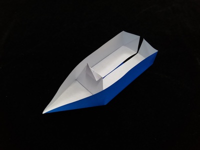 Origami Racing boat by Masayuki Umemoto on giladorigami.com